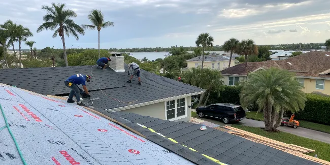 Window technician installing a window